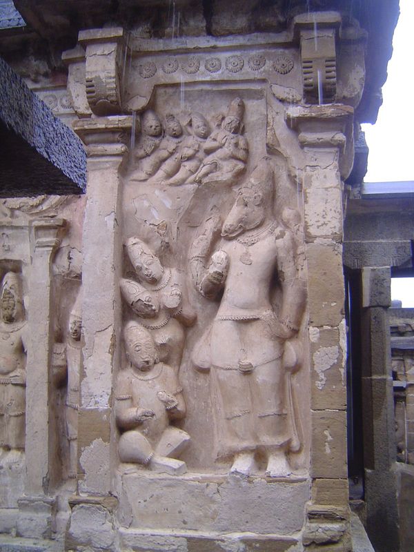 We've just turned the corner. On the right is the bridge that passes over the moat and leads to the shrine. Here Hayagriva, the horse-headed