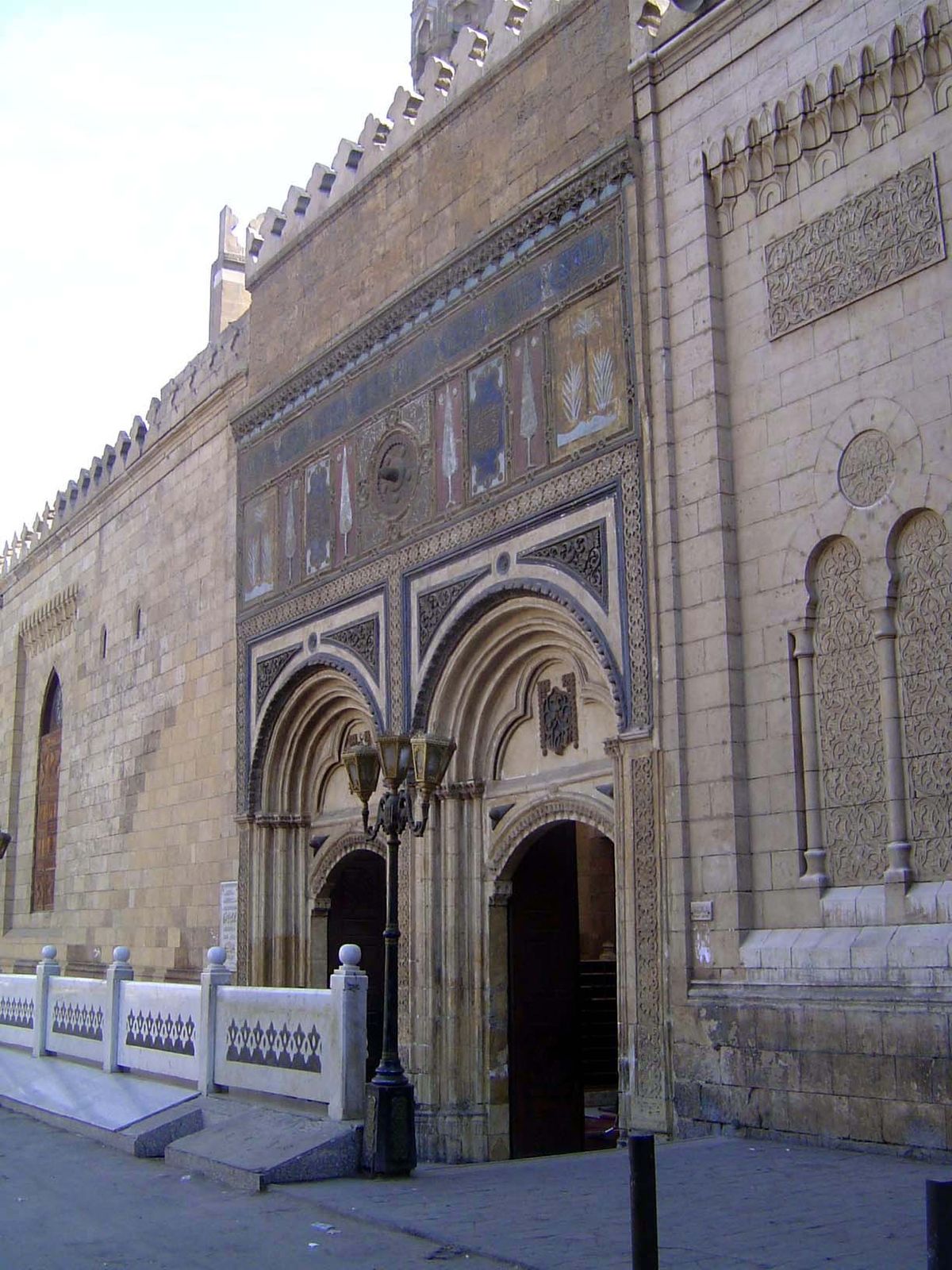 No. 97 The Mosque of al-Azhar, "The Shining," was established in 970 as the new city's chief mosque. A side door is shown here because the m