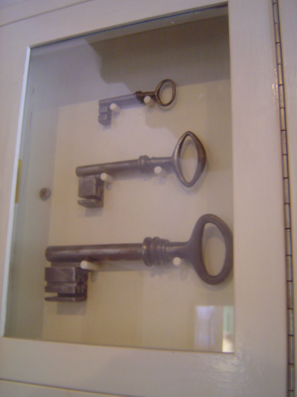 The safe was opened with three keys, each held by a different person.