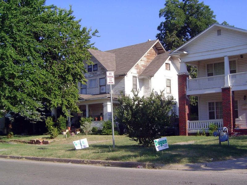 These houses are across the street from the south side of the college grounds. The house on the left, built in 1910 at 1316 NW 17th, was sol