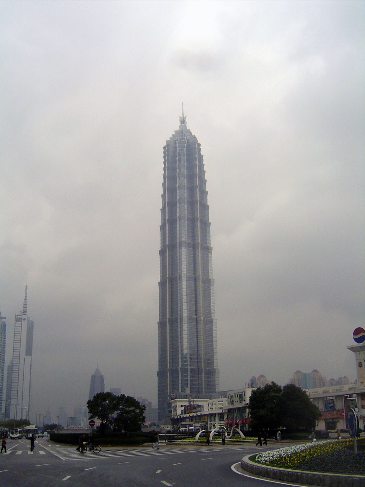 The heavenly mists clear to reveal a structure whose setbacks are supposed to echo a pagoda.