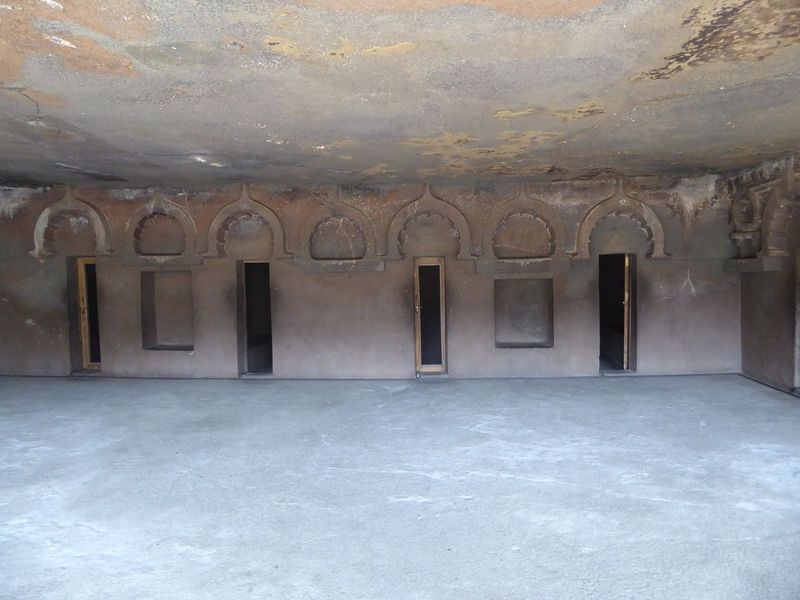 Here's the inside. It has twelve cells, each with two benches serving as beds. In other words, there's accommodation for 24 monks. Not much 