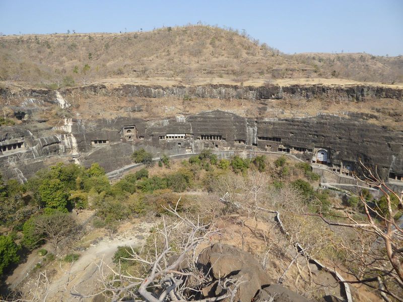 Three chaityas: Caves 19, 10 with its white shades, and 9, half in natural shade. Unfinished 29 is at the upper left.