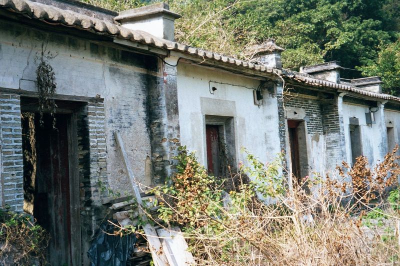 The houses shrink to a single story—in this case, all abandoned.