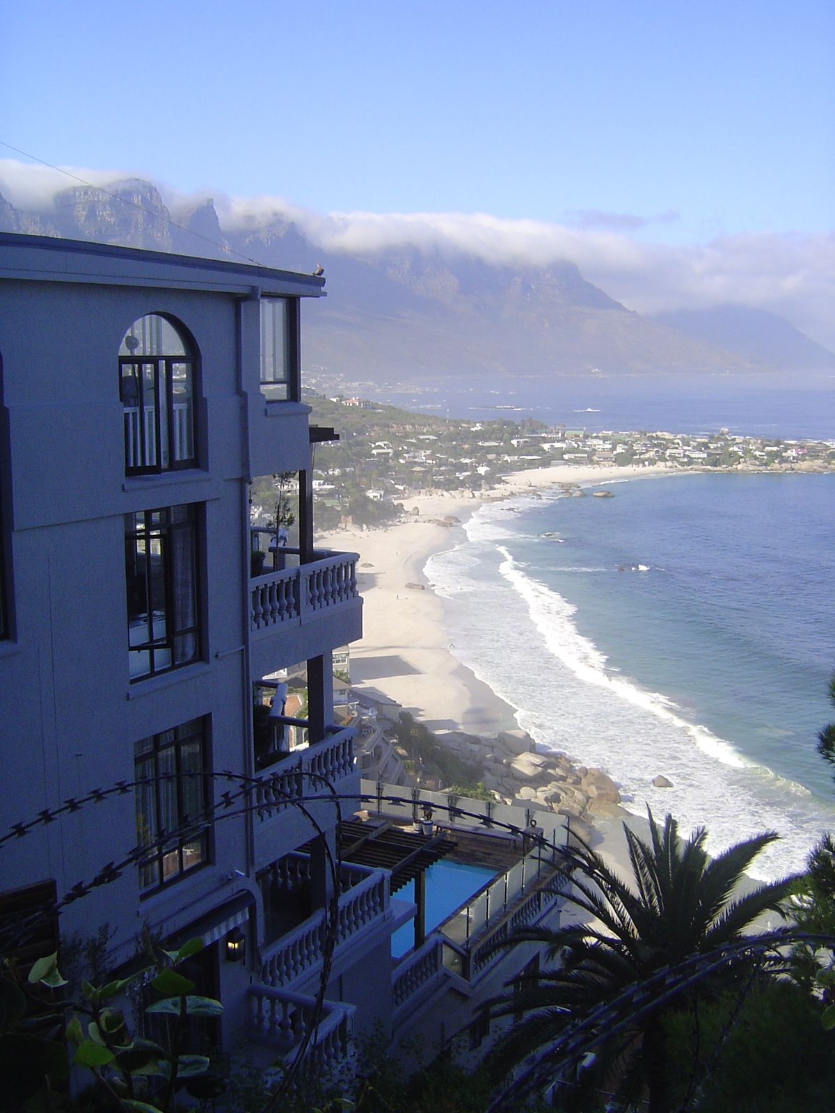 Camp's Bay, with Table Mountain in the background and a bit of security in the fore.