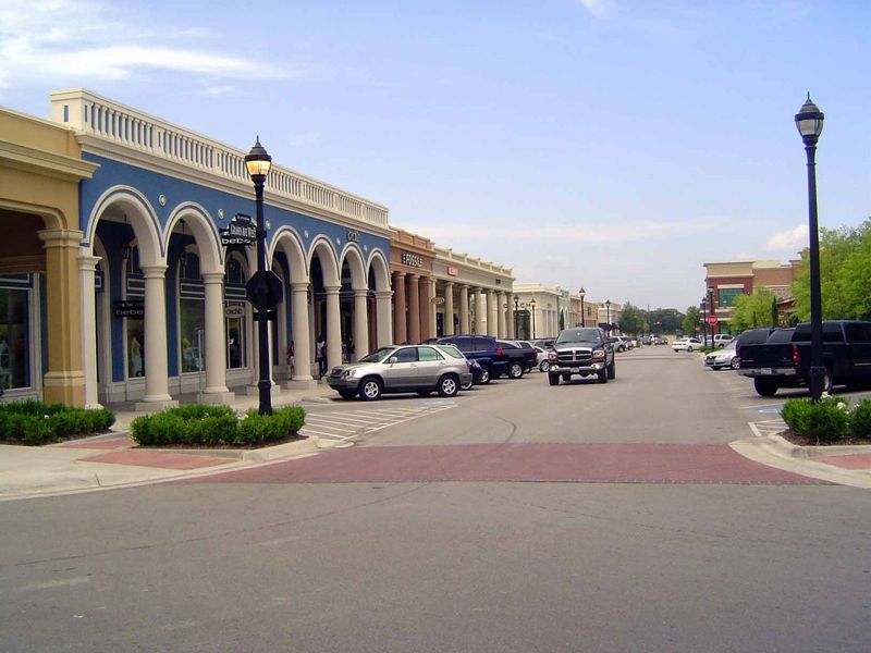 Parts of the development march to a different drummer, like this arcade along Grand Avenue.