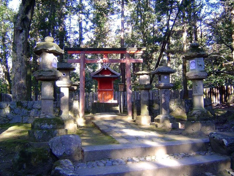 Along the path: a small shrine in the style of the Kasuga shrines themselves.