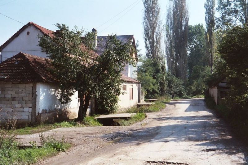 A few hundred yards outside town, a village road heads into the countryside.