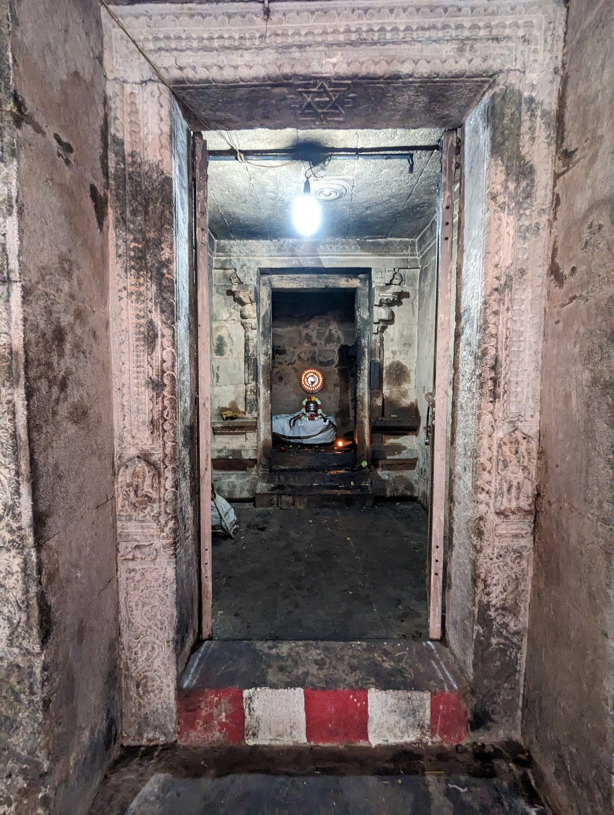 Here's a Shiva lingam in a peripheral shrine or, to use the Sanskrit name, the garbhagriya, literally womb house.  Please do not criticize t