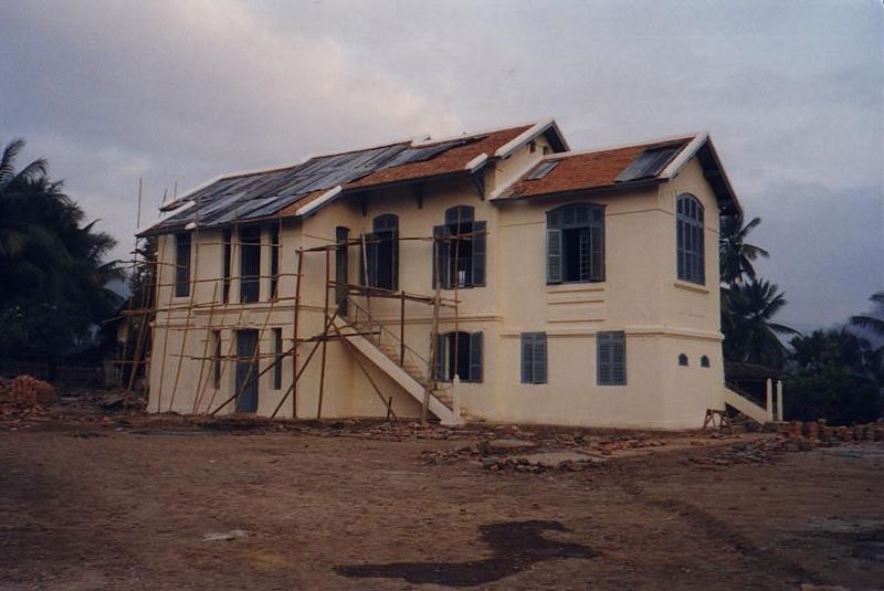 The former French customs house, at the tip of the peninsula and here under renovation.