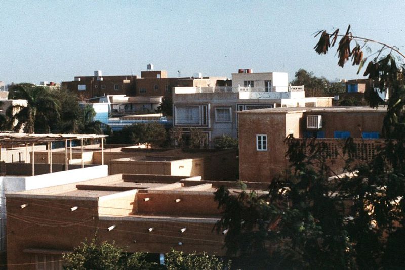 A view from the roof. The watertanks are ubiquitous, testimony to the erratic piped-water supply. You need more than a tank, though: you als