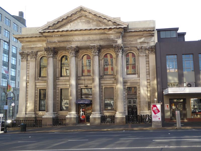 The last surviving Greek temple in Dunedin. Now it's Stilettos Revue Bar, but when built in 1874 it belonged to the Union Bank. Later photog