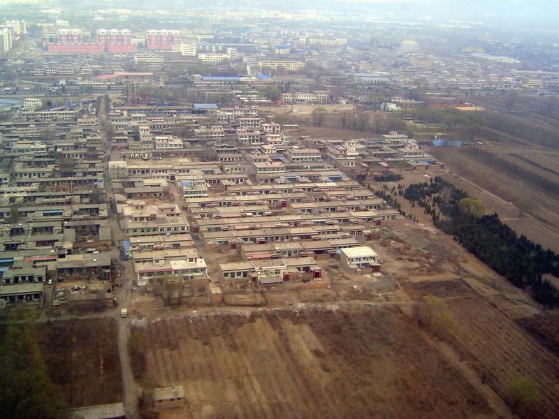 The older areas are a reminder of the poverty from which China is emerging.