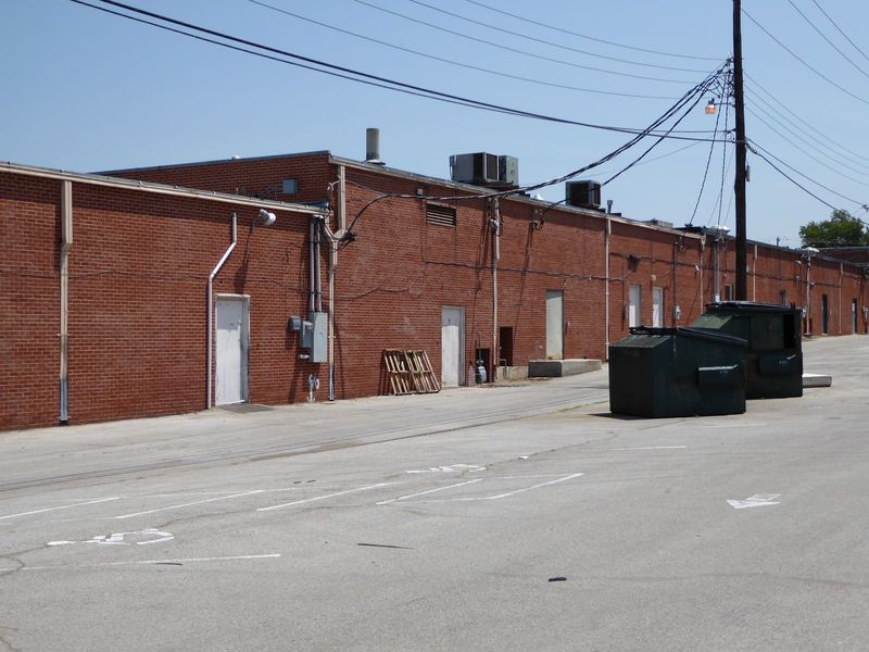 The back of the shopping center remains almost untouched from its earliest days.
