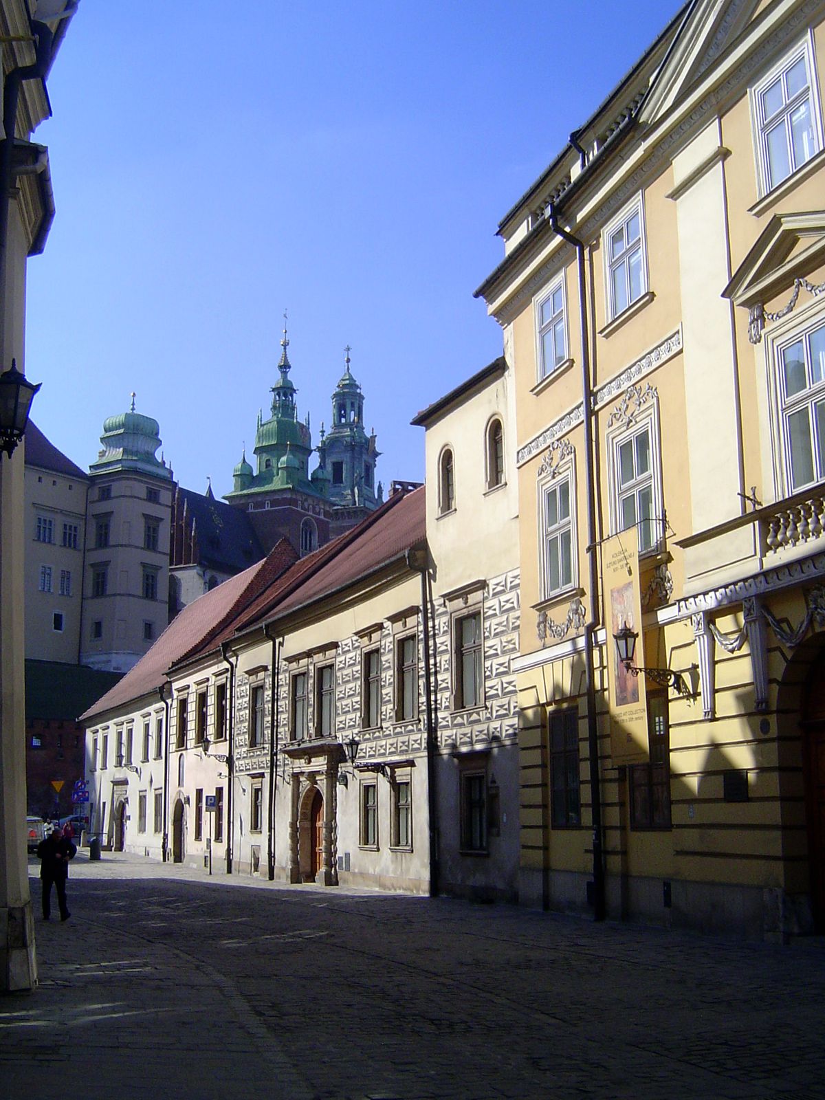 A good view of the Zygmunt Tower with its huge bell; to its right is the much taller but more distant Clock Tower. The view is from Kanonicz