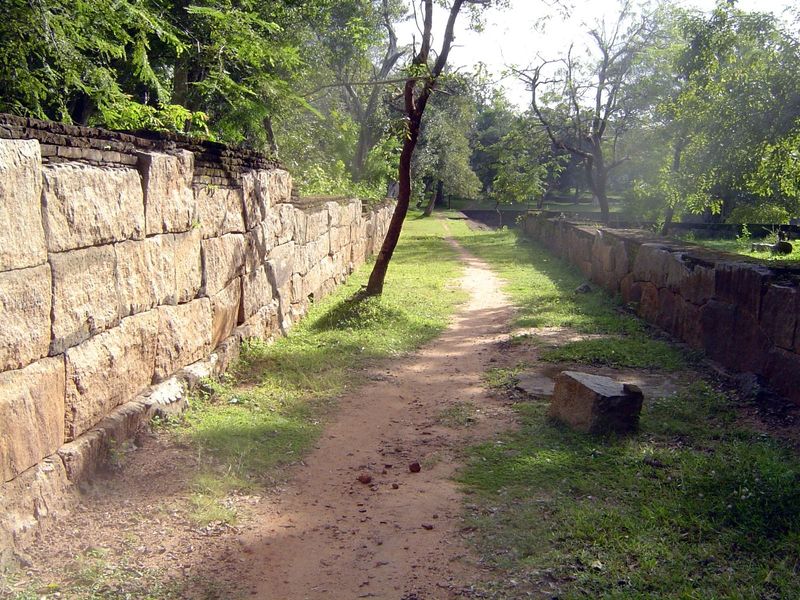 Granite, too, are the walls flanking this road near the Elephant Pond. We've about to see something special.