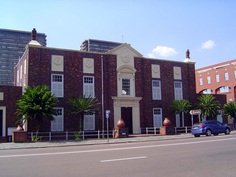 A block away, the old Pass Building, where blacks lined up to beg permission for the hated documents used to control their movement.