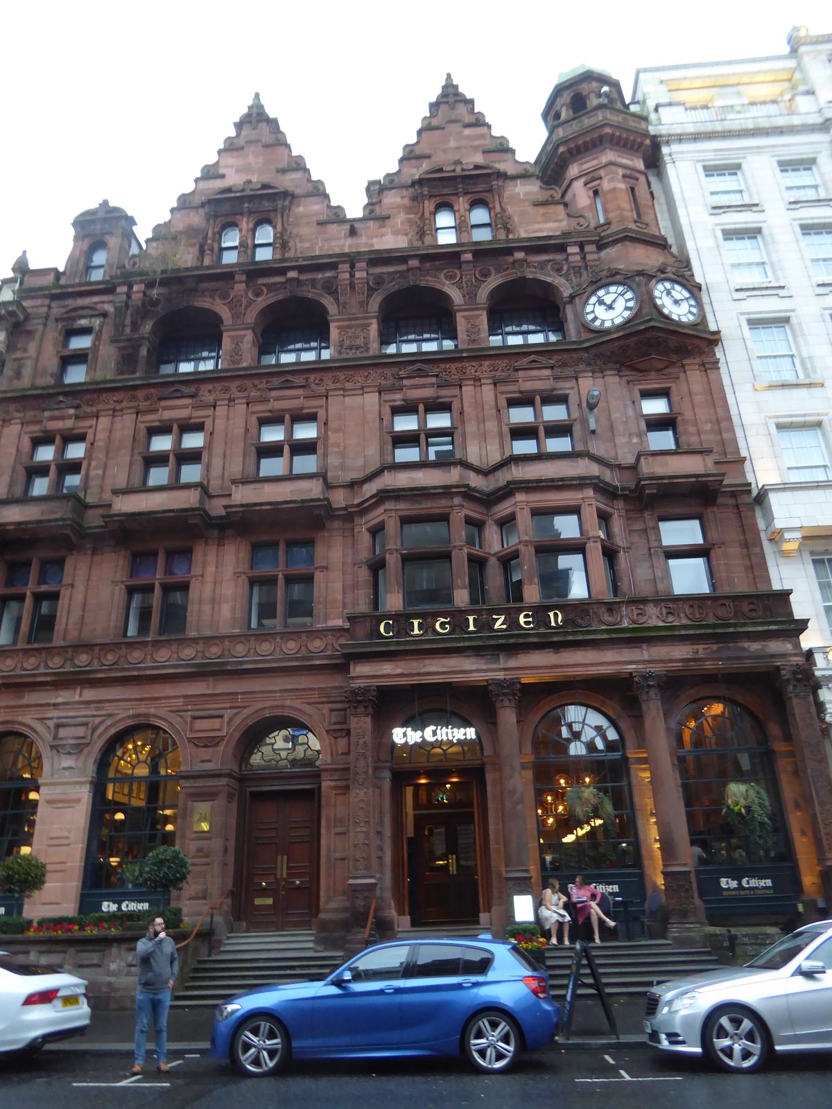 All that red sandstone invited a reaction. When that reaction arrived, it plopped down next to the building housing the Evening Citizen, inc