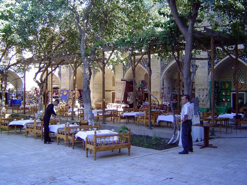The pool itself has become a social center, rimmed with poolside chaikhanas or tea houses.