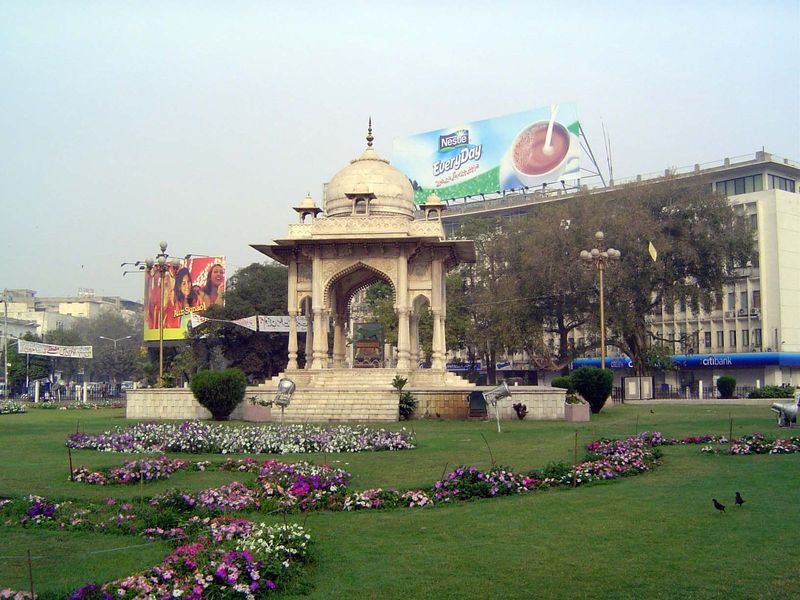 We're at Charing Cross, a name that has survived the British Raj by more than 50 years. In a patch of grass, there's a marble pavilion by Bh