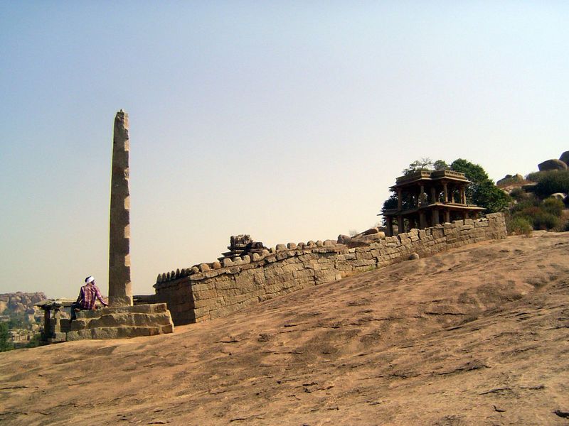 The post may be a manastambha or column of honor, commonly erected before Jain temples.