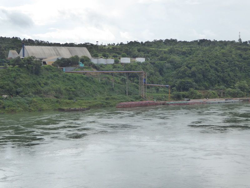 We've come downstream about five miles. Looks like there are soybeans in Paraguay, too—and barges to float them down to the sea.