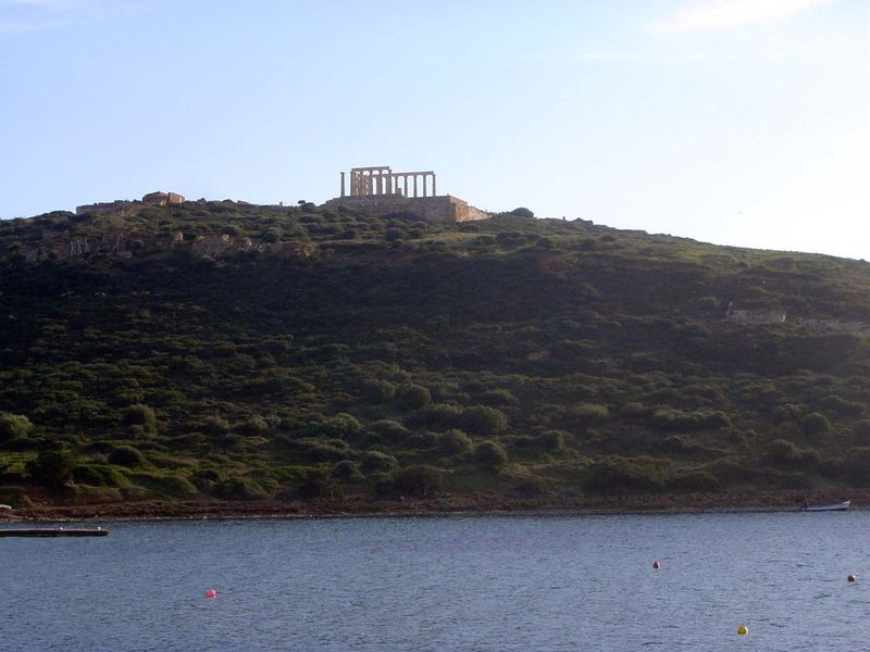 Looking south to the temple from across a bay; on the other side of the hill is the open Mediterranean.