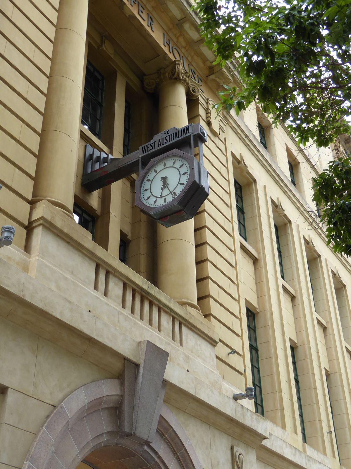 Time moves on, but clocks don't necessarily. The paper's still in business a couple of miles away in a building so boring it's invisible.