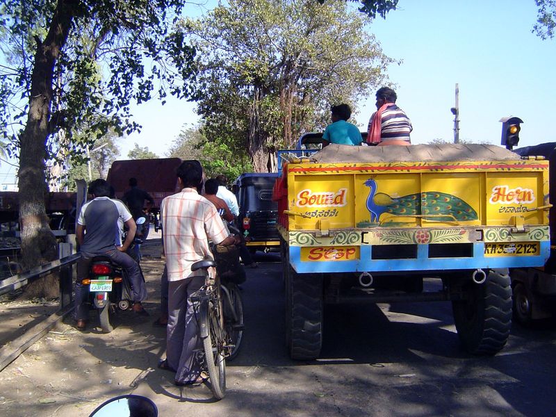 We've gone downstream perhaps 10 miles and are trying to reach Hampi, but we're caught in traffic again. We could get out and find the probl