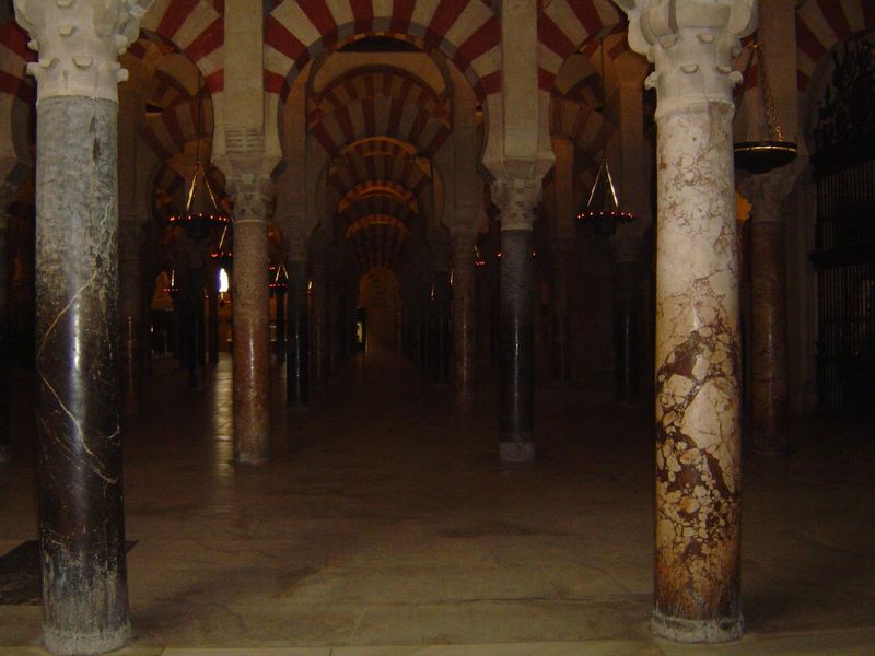 The walls came later, with the conversion to a church, and they explain why the interior of the old mosque is now so dark. In addition to da