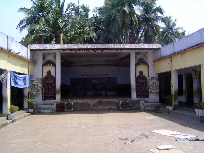 We just stepped off the main road and through a doorway to this courtyard with a stage at the far end. What is it?