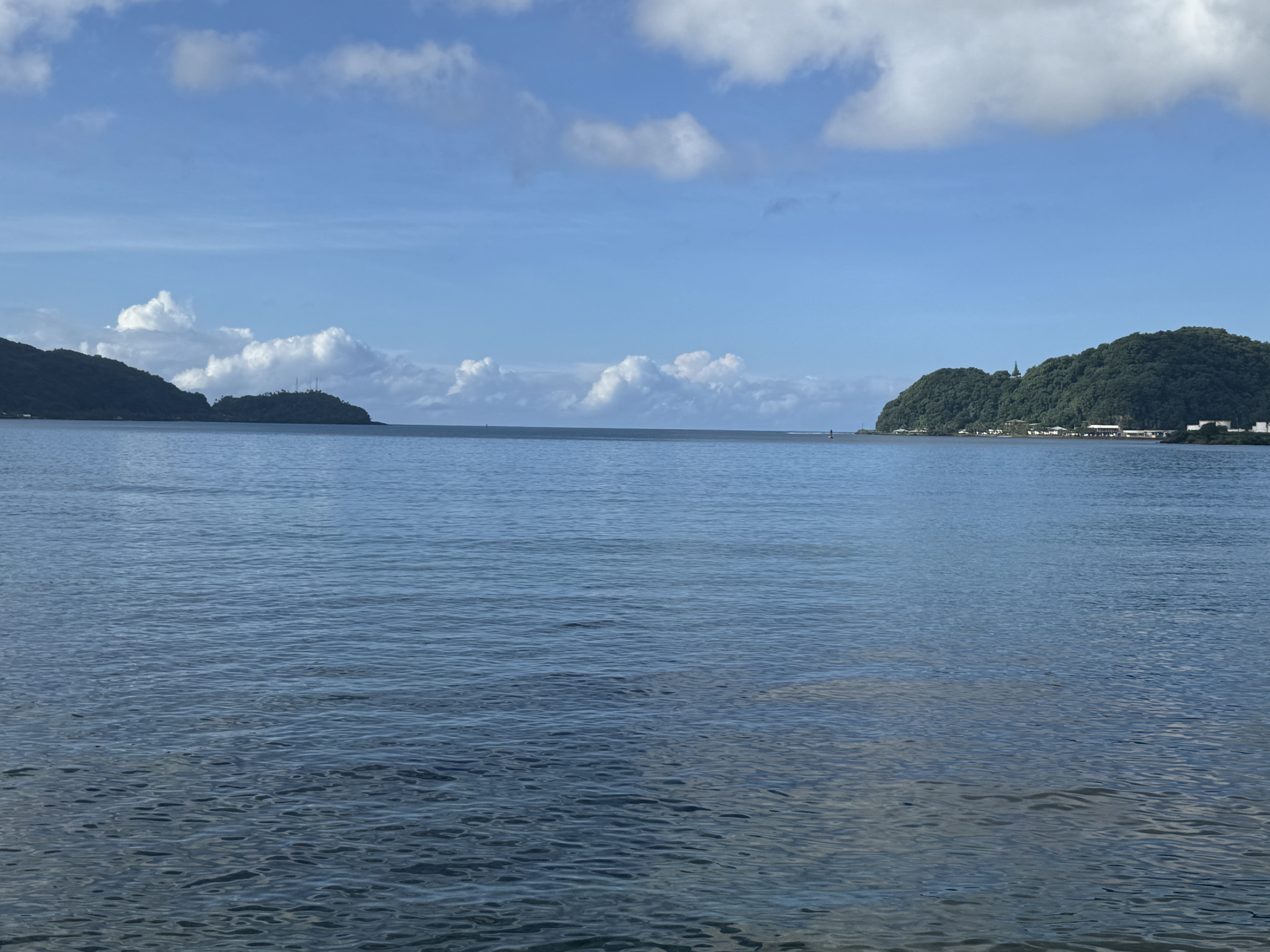 A view of the harbor from Pago Pago.  The old naval station, now a civilian port, is on the right.