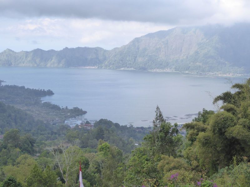 Let's get a breath of fresh air at the top of the island, where Lake Batur sits in the caldera of Mount Batur. The caldera formed 23,000 yea