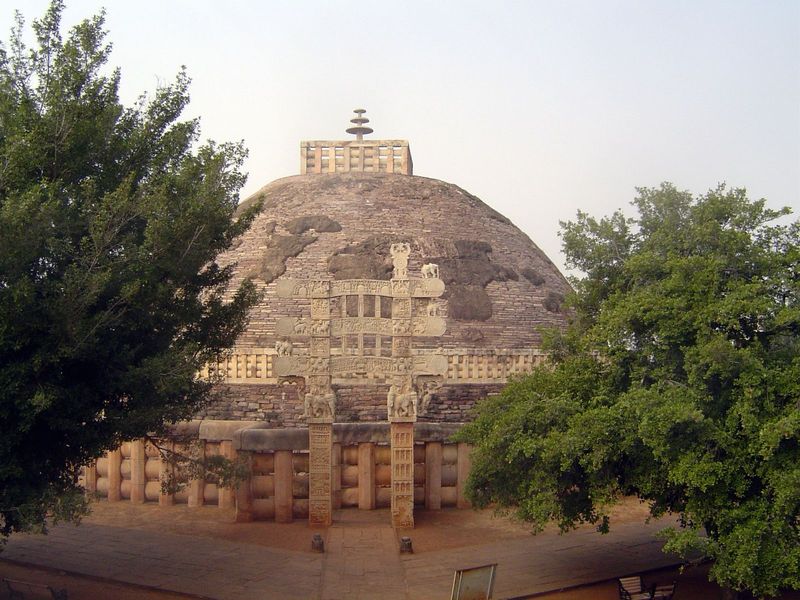 The east side. The stupa was abandoned in the 12th century and discovered by the British in 1818. The south gateway had fallen over, but the
