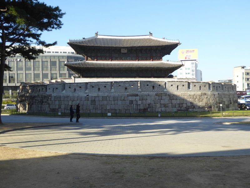 The gate was built in 1398 but rebuilt in 1869. The wall around it was disrupted when streetcars began running along the avenue stretching t