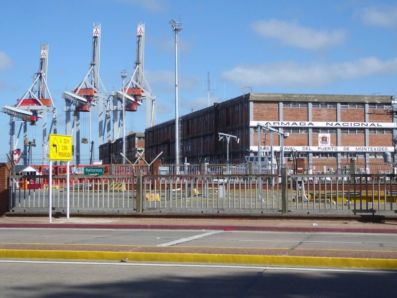 Yes, every country needs a navy, in this case grandly guarded by a trio of ship-to-shore gantry cranes.