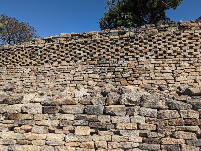 Simpler still. East side restoration work was undertaken after 1982 by students from Gweru's Chaplin High School working under direction fro