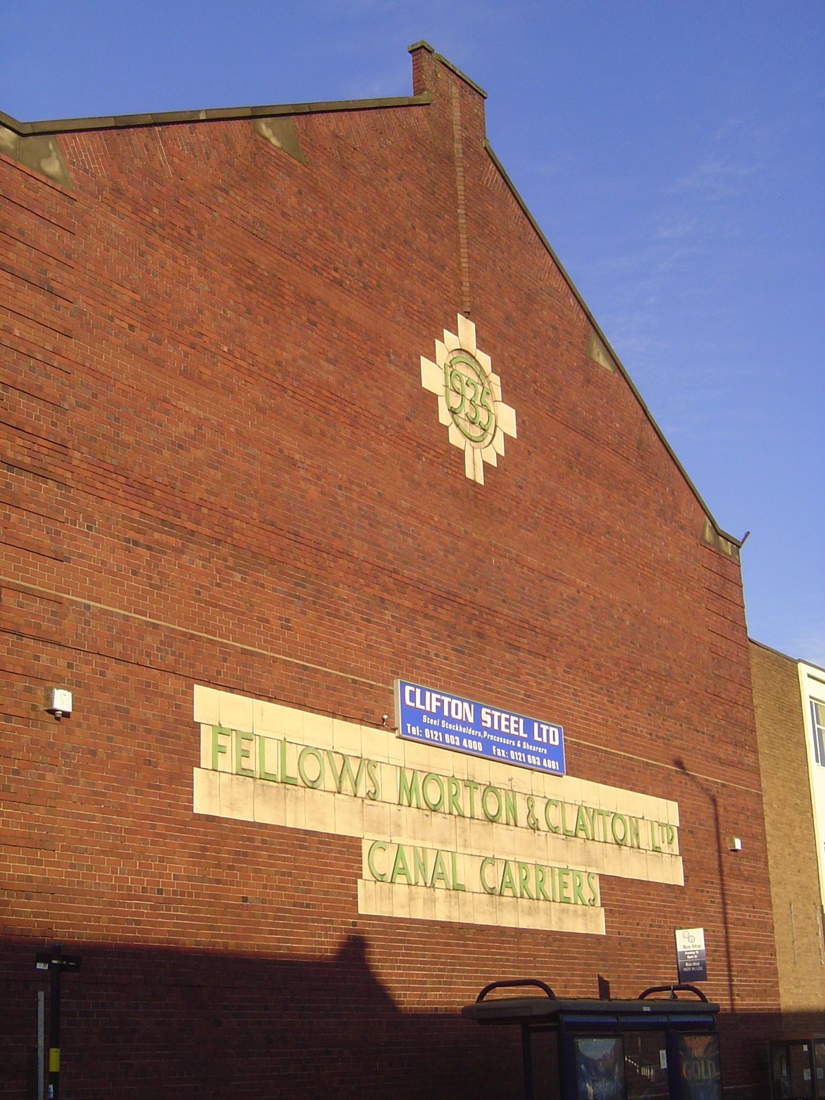 Freight companies needed warehouse space. The company that built this warehouse, next to the now-filled Warwick and Birmingham Basin, stayed