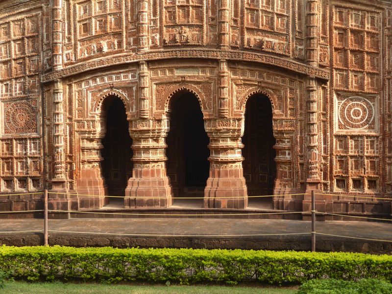 The temple, as became characteristic of Bishnupur's other temples, is covered with hundreds of terracotta panels, some decorative but others