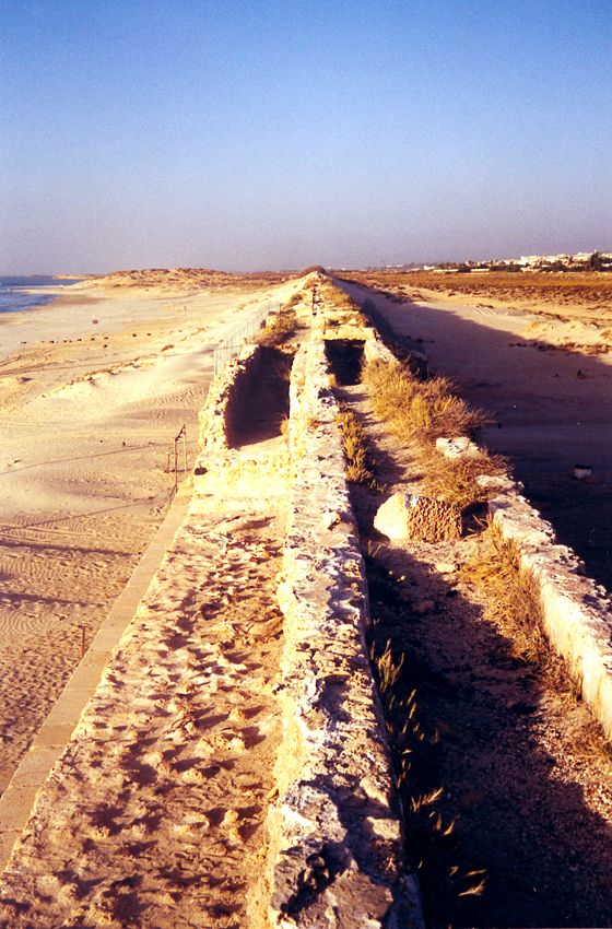 Herod built an aqueduct to convey water to Caesarea from the Crocodile River: his is the right-half of the structure. Hadrian doubled the aq