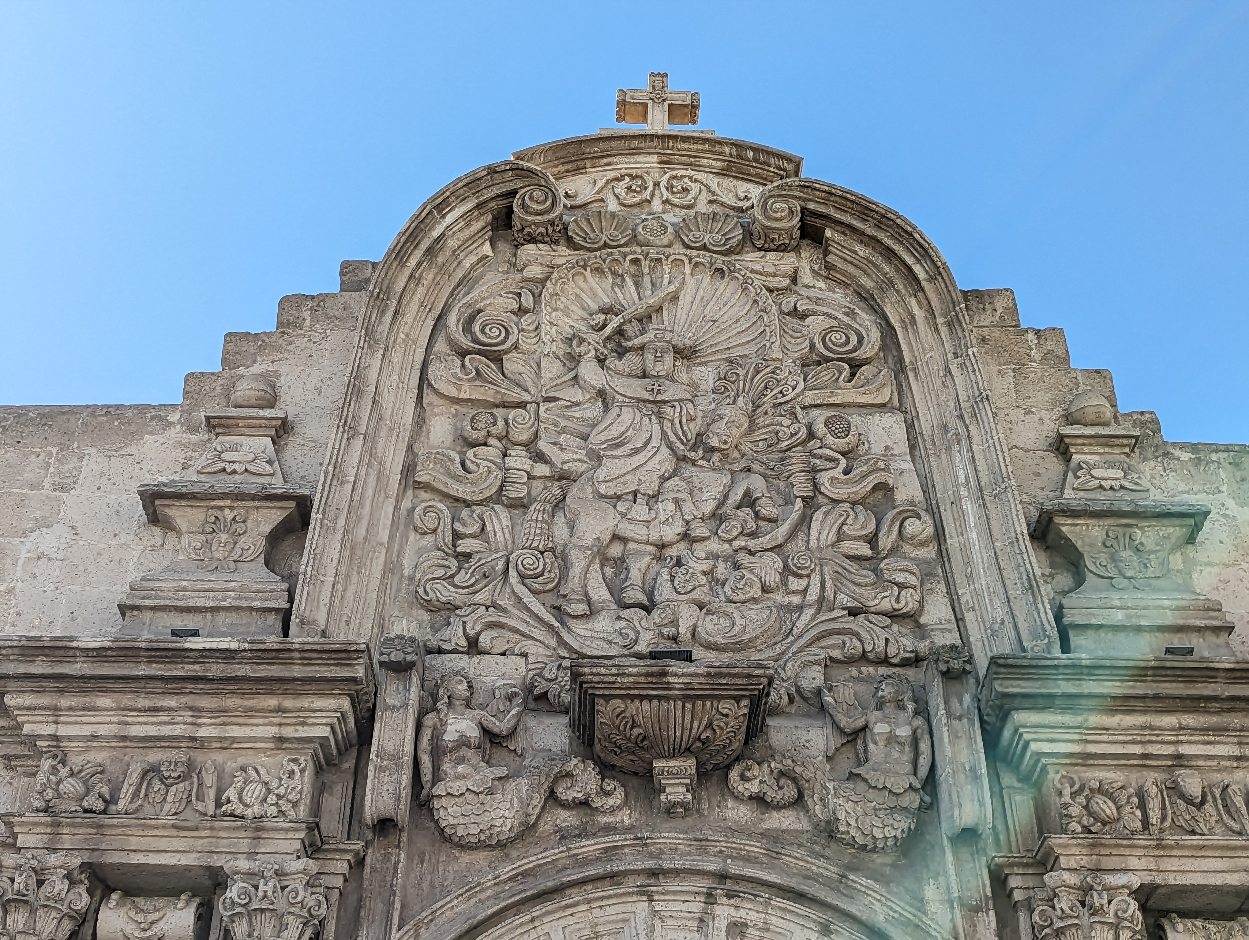 The dominant figure is Saint James, busy slaying Moors.