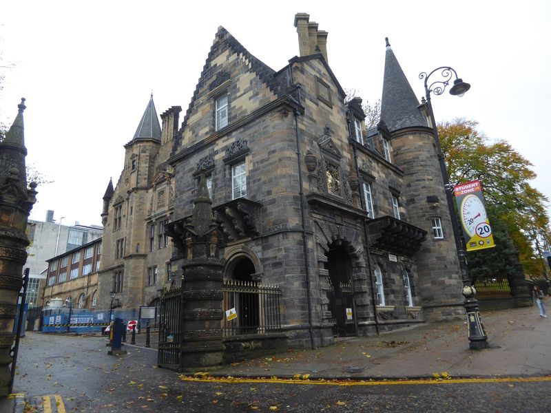 This gatehouse is a fragment of the old campus and dates from the 1600s. Who paid to take it apart and reassemble it as a gatehouse? Sir Wil