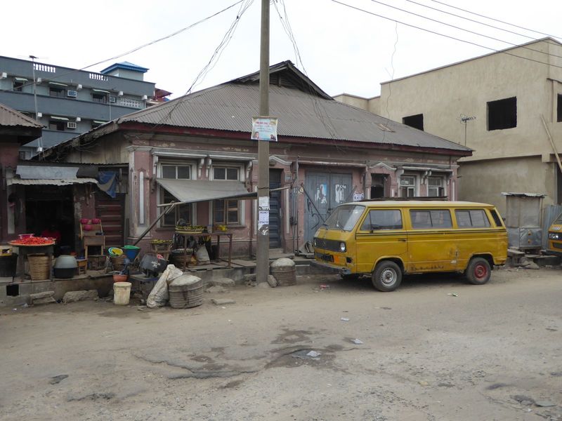 A few old simple houses scrape by on Lagos Island itself. Here's one.