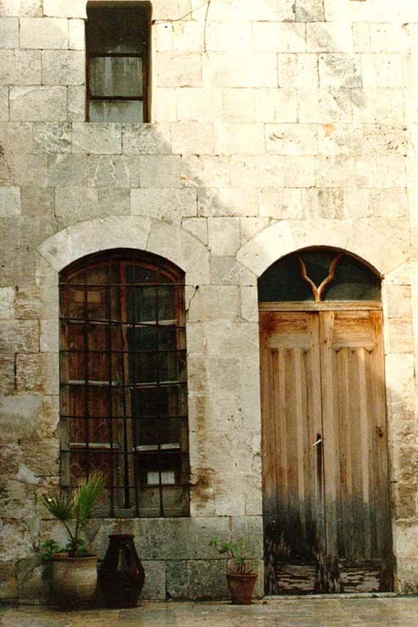 A private house in the al-Jubeilah district, on the other side of the citadel. All rooms are entered through doorways like this, off a squar