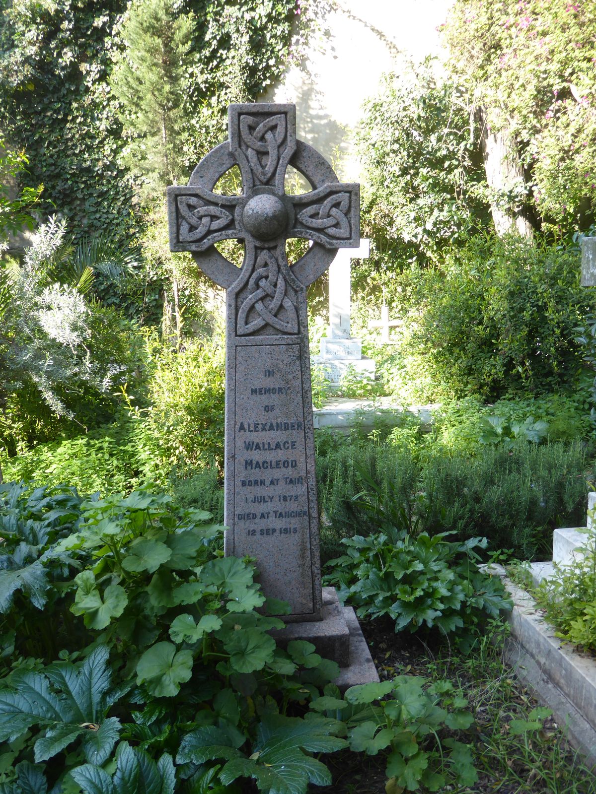 Outside the church, a handsome Celtic cross.
