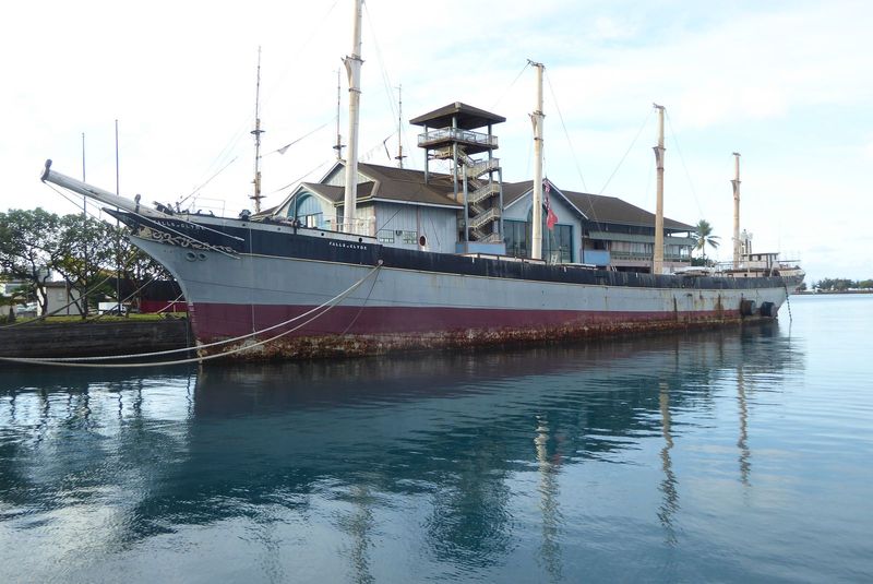 A minute's walk brings us to the Falls of Clyde, an iron-hulled four-master built in Glasgow in 1878. It went to work in India, then got dem