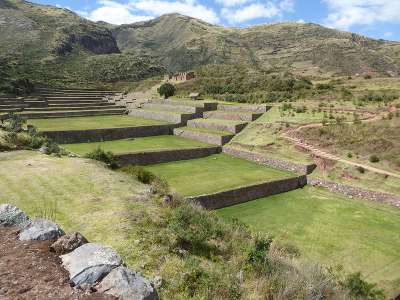 Now we're 20 miles south of Cusco and about a mile and a half up in the hills east of the village of Tip n. The 1,300-foot-long flight of te