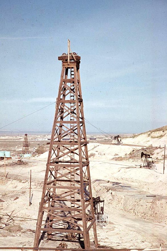 Not a fun ladder to climb, but some oilmen preferred wooden derricks to steel ones, which gave little warning when overloaded. The redwood d