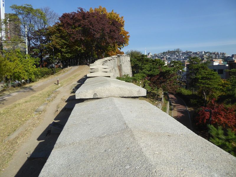 The Japanese set about destroying the city's wall and mostly succeeded. Bits have subsequently been restored.