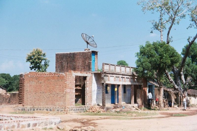 This is a poor part of India, but cell phones and satellite TV are almost everywhere.